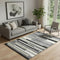 5' X 8' Black Gray And Ivory Striped Washable Area Rug With UV Protection