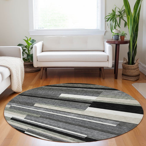 8' Black Gray And Ivory Striped Washable Round Rug With UV Protection