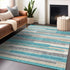 9' X 12' Teal Ivory And Beige Striped Washable Area Rug With UV Protection
