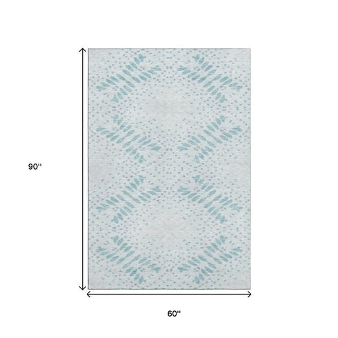 5' X 8' Teal And Ivory Floral Washable Area Rug With UV Protection