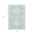 5' X 8' Teal And Ivory Floral Washable Area Rug With UV Protection