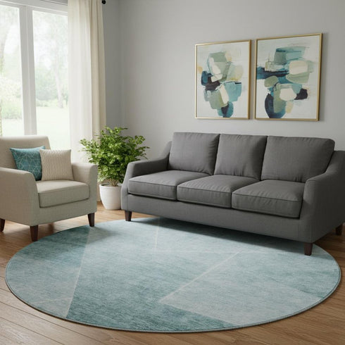 8' Teal And Ivory Geometric Washable Round Rug With UV Protection
