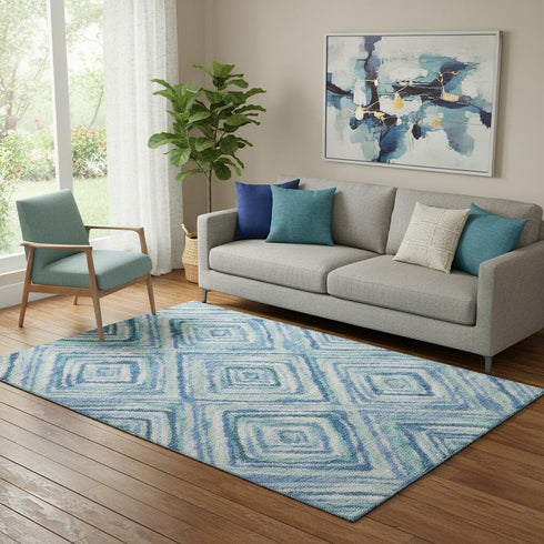 5' X 8' Blue Green And Ivory Geometric Washable Area Rug With UV Protection