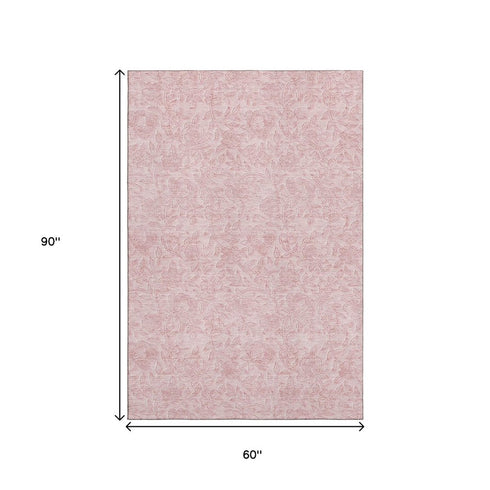 5' X 8' Pink And Ivory Floral Washable Area Rug With UV Protection
