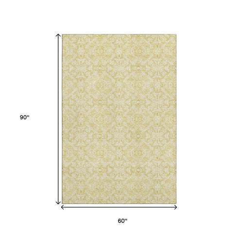 5' X 8' Gold And Ivory Medallion Washable Area Rug With UV Protection