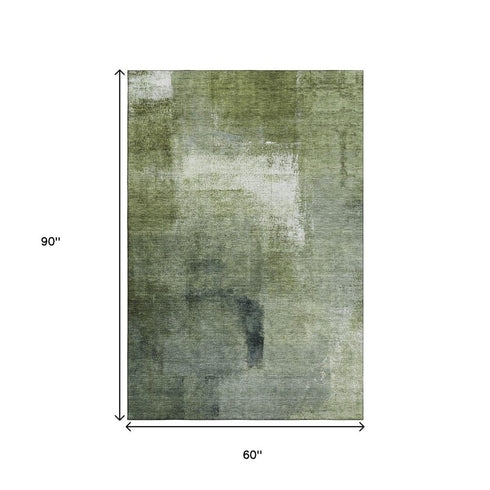 5' X 8' Green And Ivory Abstract Washable Area Rug With UV Protection