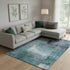 8' X 10' Teal Ivory And Purple Abstract Washable Area Rug With UV Protection