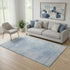 5' X 8' Denim Blue And Ivory Abstract Washable Area Rug With UV Protection
