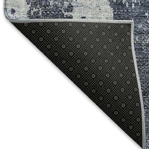 5' X 8' Navy Blue And Ivory Abstract Washable Area Rug With UV Protection