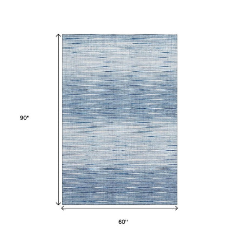 5' X 8' Blue And Ivory Abstract Washable Area Rug With UV Protection