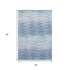 5' X 8' Blue And Ivory Abstract Washable Area Rug With UV Protection
