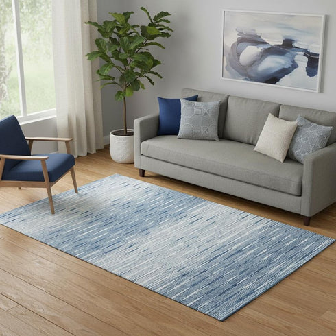 5' X 8' Blue And Ivory Abstract Washable Area Rug With UV Protection