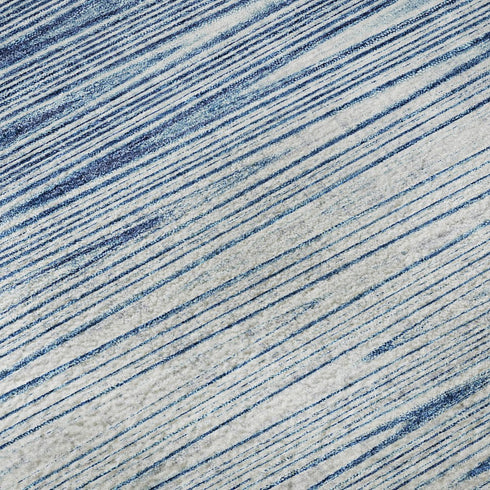8' Blue And Ivory Abstract Washable Round Rug With UV Protection