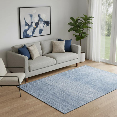 5' X 8' Denim Blue And Ivory Abstract Washable Area Rug With UV Protection
