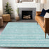 5' X 8' Teal And Ivory Southwestern Washable Area Rug With UV Protection