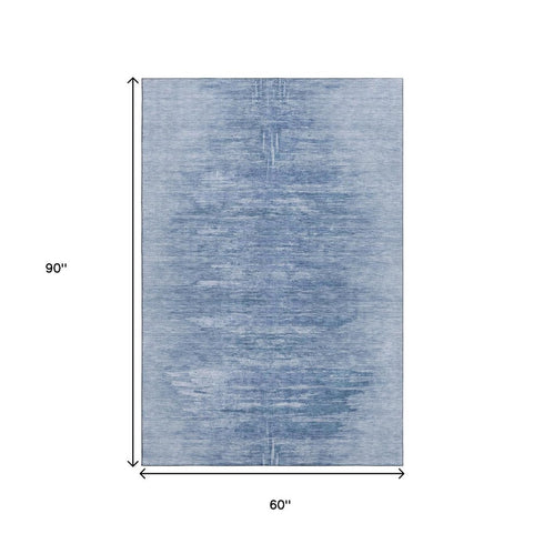 5' X 8' Blue And Ivory Abstract Washable Area Rug With UV Protection
