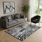 5' X 8' Black And Ivory Zebra Print Washable Area Rug With UV Protection