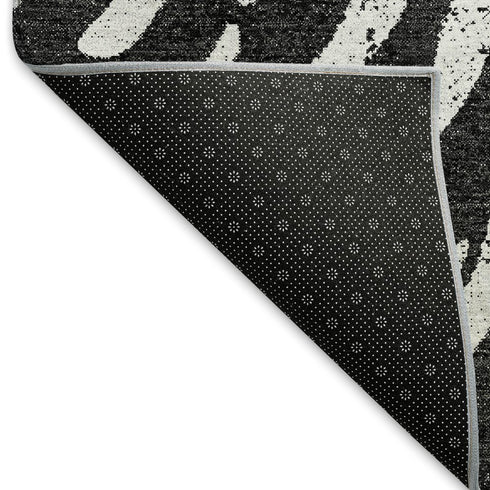 5' X 8' Black And Ivory Zebra Print Washable Area Rug With UV Protection