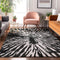 9' X 12' Black And Ivory Zebra Print Washable Area Rug With UV Protection