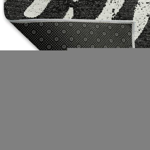9' X 12' Black And Ivory Zebra Print Washable Area Rug With UV Protection