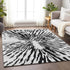 9' X 12' Ivory And Black Zebra Print Washable Area Rug With UV Protection