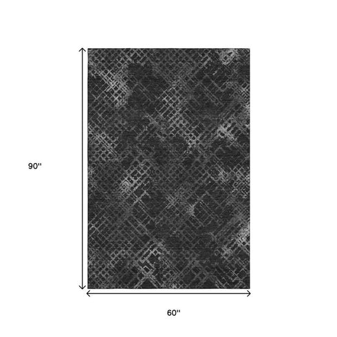 5' X 8' Charcoal And Ivory Abstract Geometric Washable Area Rug With UV Protection