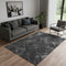 5' X 8' Charcoal And Ivory Abstract Geometric Washable Area Rug With UV Protection