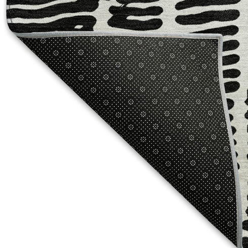 5' X 8' Black And Ivory Vermicular Washable Area Rug With UV Protection