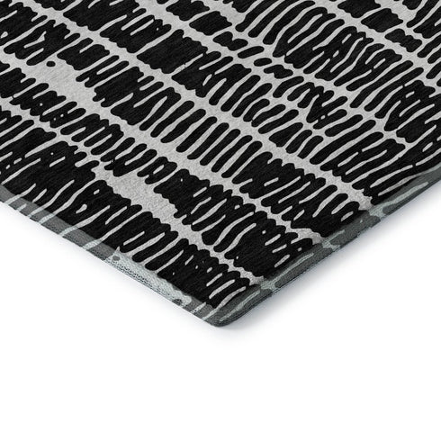 5' X 8' Black And Ivory Vermicular Washable Area Rug With UV Protection