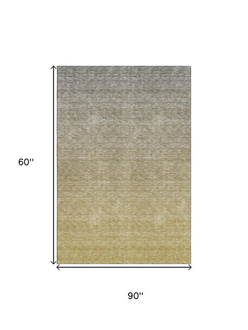 5' X 8' Gold And Beige Ombre Washable Area Rug With UV Protection