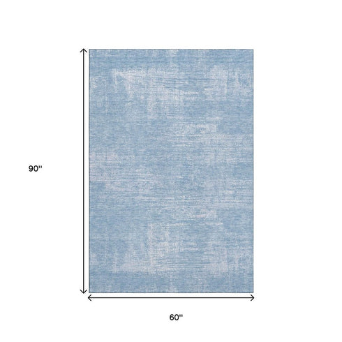 5' X 8' Blue And Ivory Abstract Washable Area Rug With UV Protection