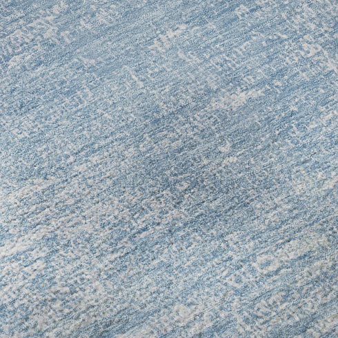 5' X 8' Blue And Ivory Abstract Washable Area Rug With UV Protection