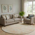 8' Coral And Ivory Abstract Washable Round Rug With UV Protection