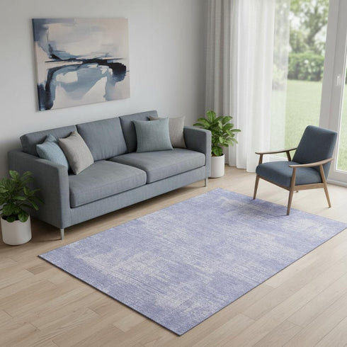 5' X 8' Lavender And Ivory Abstract Washable Area Rug With UV Protection