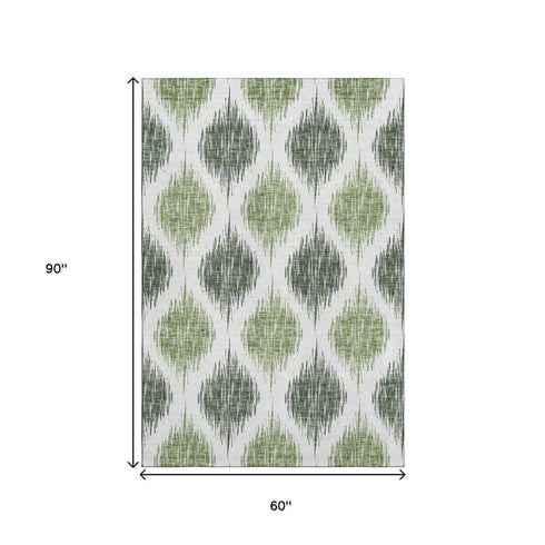 5' X 8' Fern Green And Ivory Ikat Washable Area Rug With UV Protection