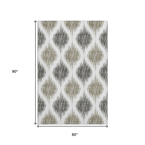 5' X 8' Taupe And Ivory Ikat Washable Area Rug With UV Protection