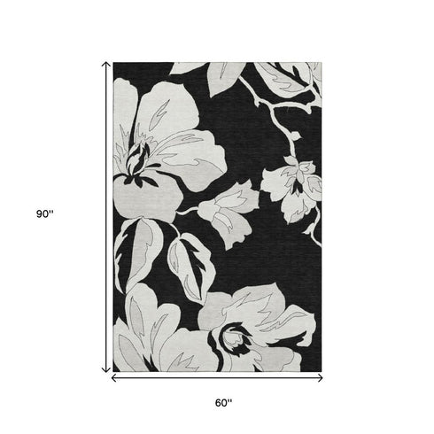 5' X 8' Black And Ivory Floral Washable Area Rug With UV Protection