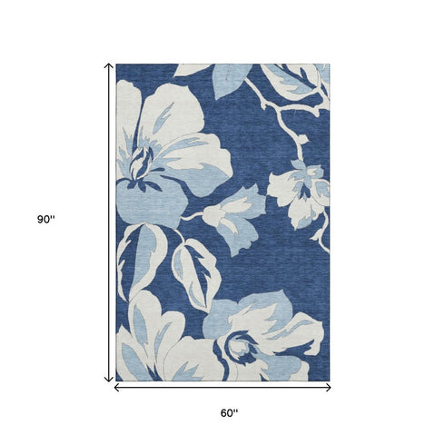 5' X 8' Navy Blue And Ivory Floral Washable Area Rug With UV Protection