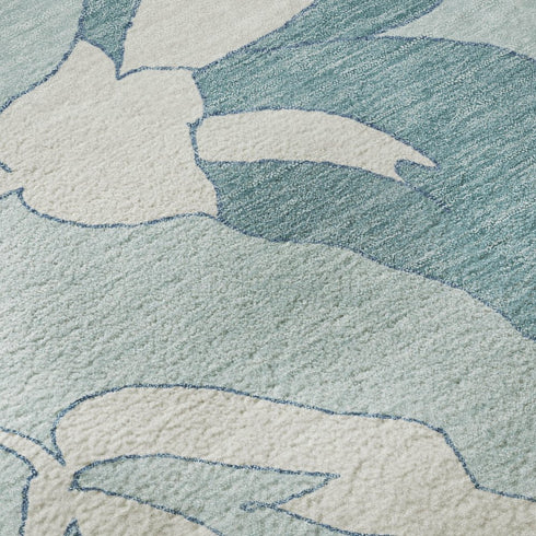 5' X 8' Teal And Ivory Floral Washable Area Rug With UV Protection