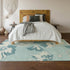 5' X 8' Teal And Ivory Floral Washable Area Rug With UV Protection