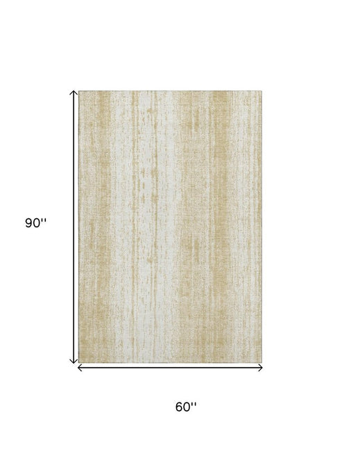 5' X 8' Gold And Ivory Striped Washable Area Rug With UV Protection