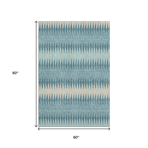 5' X 8' Teal And Beige Striped Washable Area Rug With UV Protection