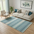 5' X 8' Teal And Beige Striped Washable Area Rug With UV Protection