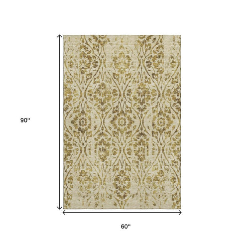 5' X 8' Gold And Beige Floral Washable Area Rug With UV Protection