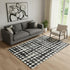 5' X 8' Black And Ivory Polka Dot Washable Area Rug With UV Protection