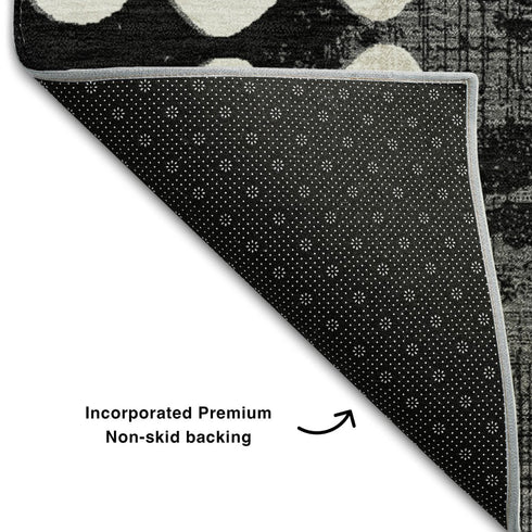 5' X 8' Black And Ivory Polka Dot Washable Area Rug With UV Protection