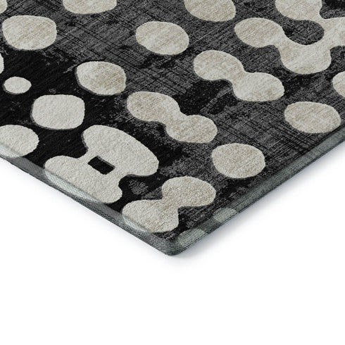 5' X 8' Black And Ivory Polka Dot Washable Area Rug With UV Protection