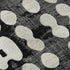 5' X 8' Black And Ivory Polka Dot Washable Area Rug With UV Protection