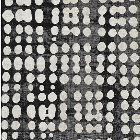 5' X 8' Black And Ivory Polka Dot Washable Area Rug With UV Protection