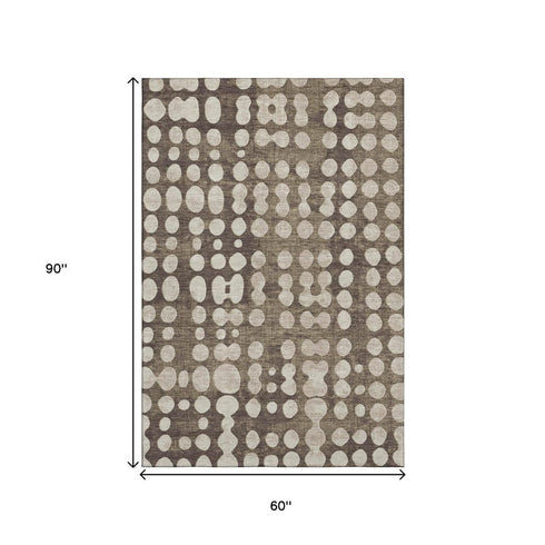 5' X 8' Brown And Beige Polka Dot Washable Area Rug With UV Protection